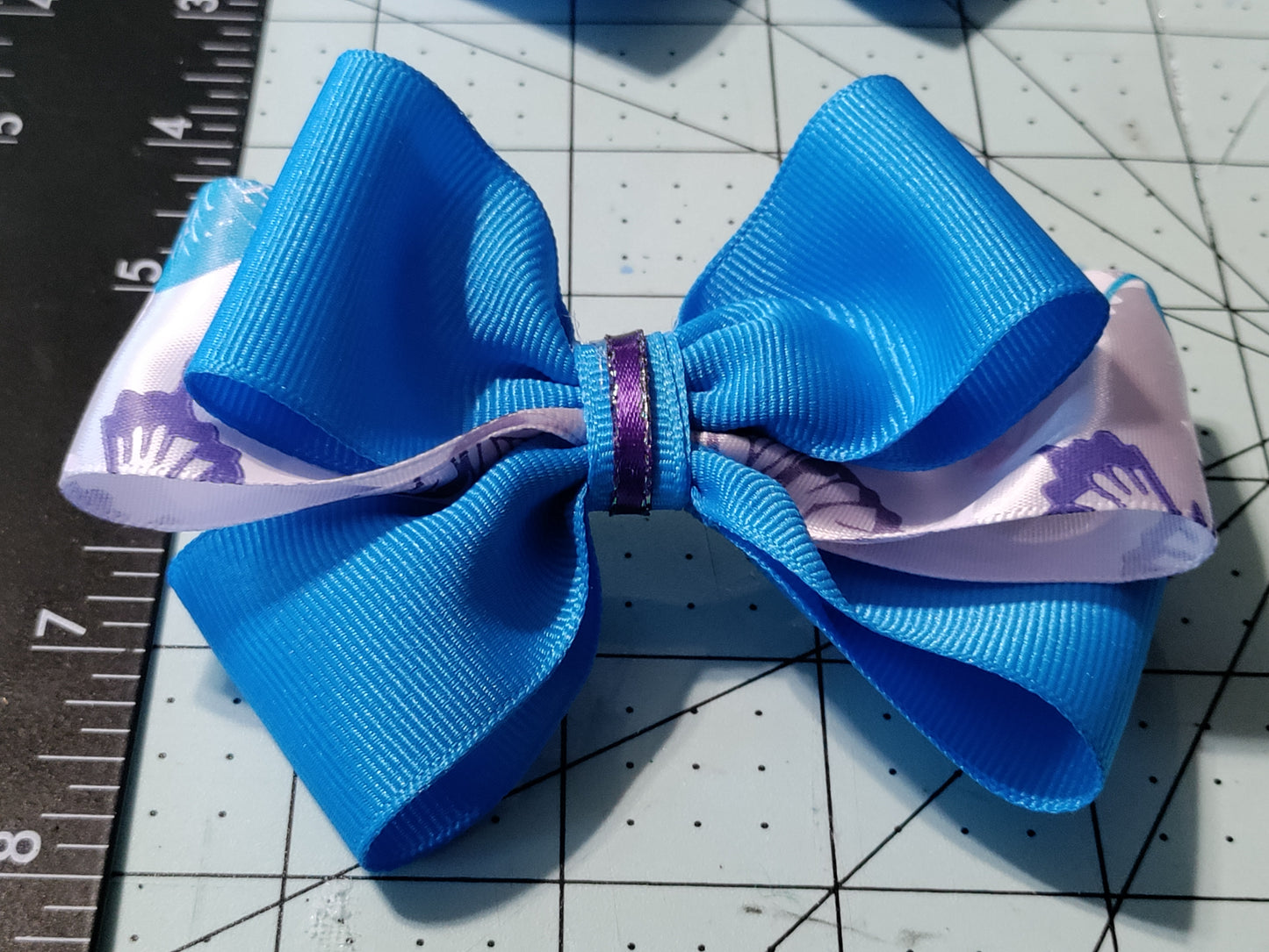 Turquoise and White Bow with Butterflies