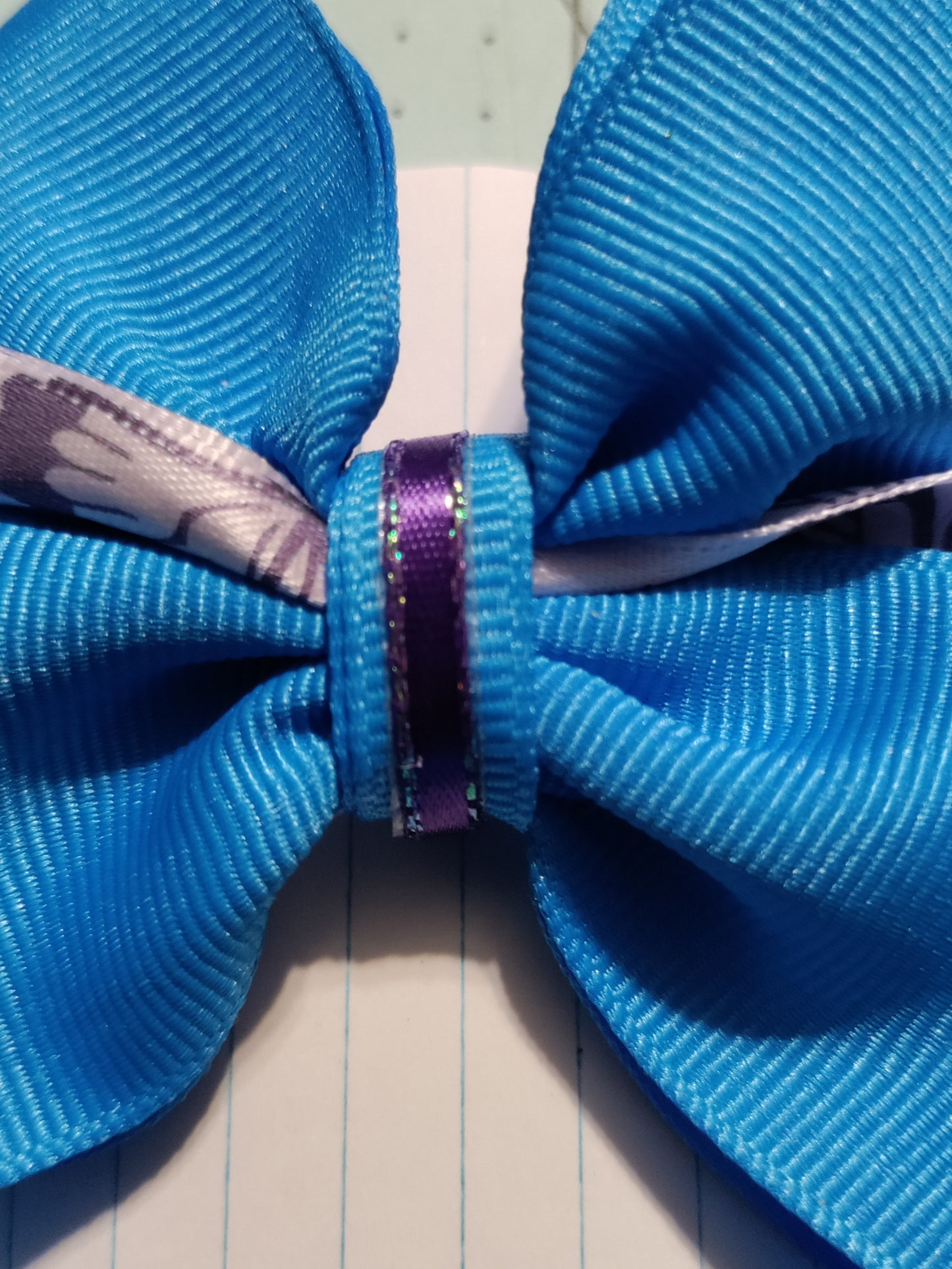 Turquoise and White Bow with Butterflies