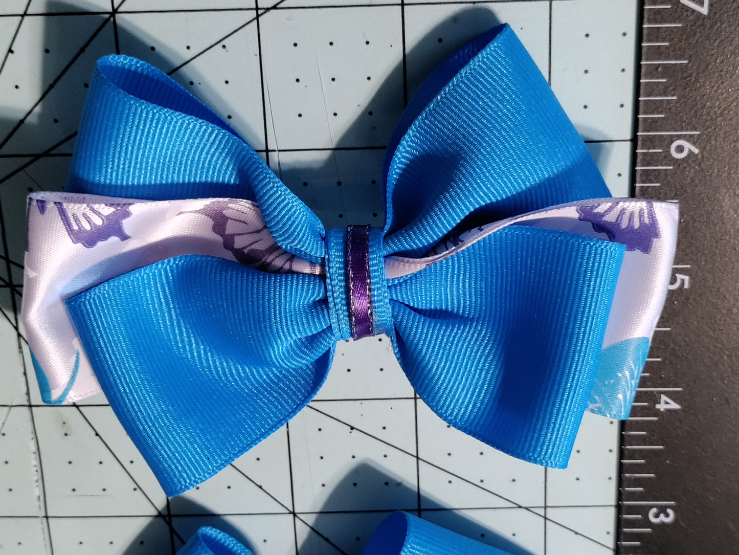 Turquoise and White Bow with Butterflies