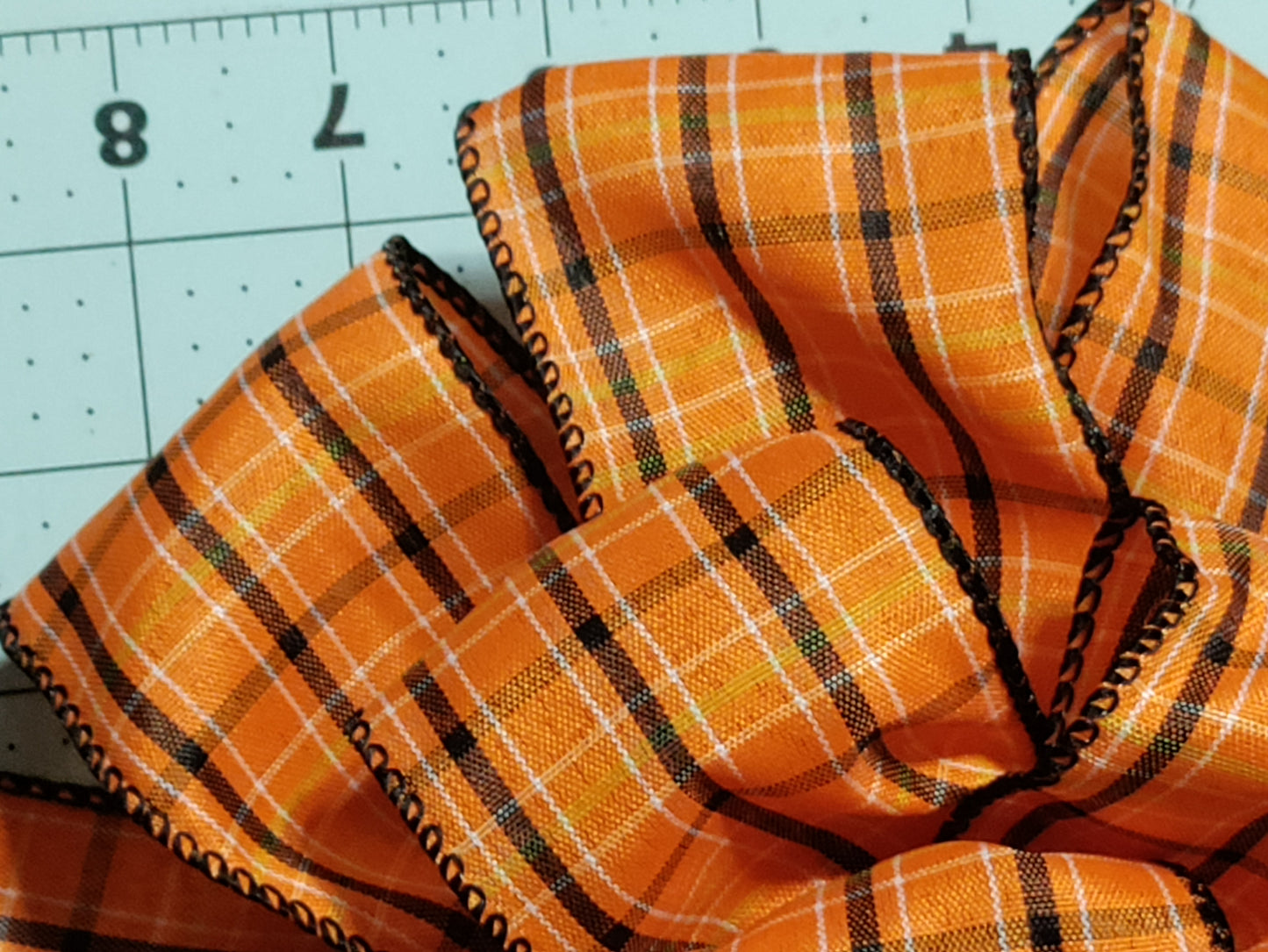 Orange with Black, White, and Yellow Stripes Bow with Tail